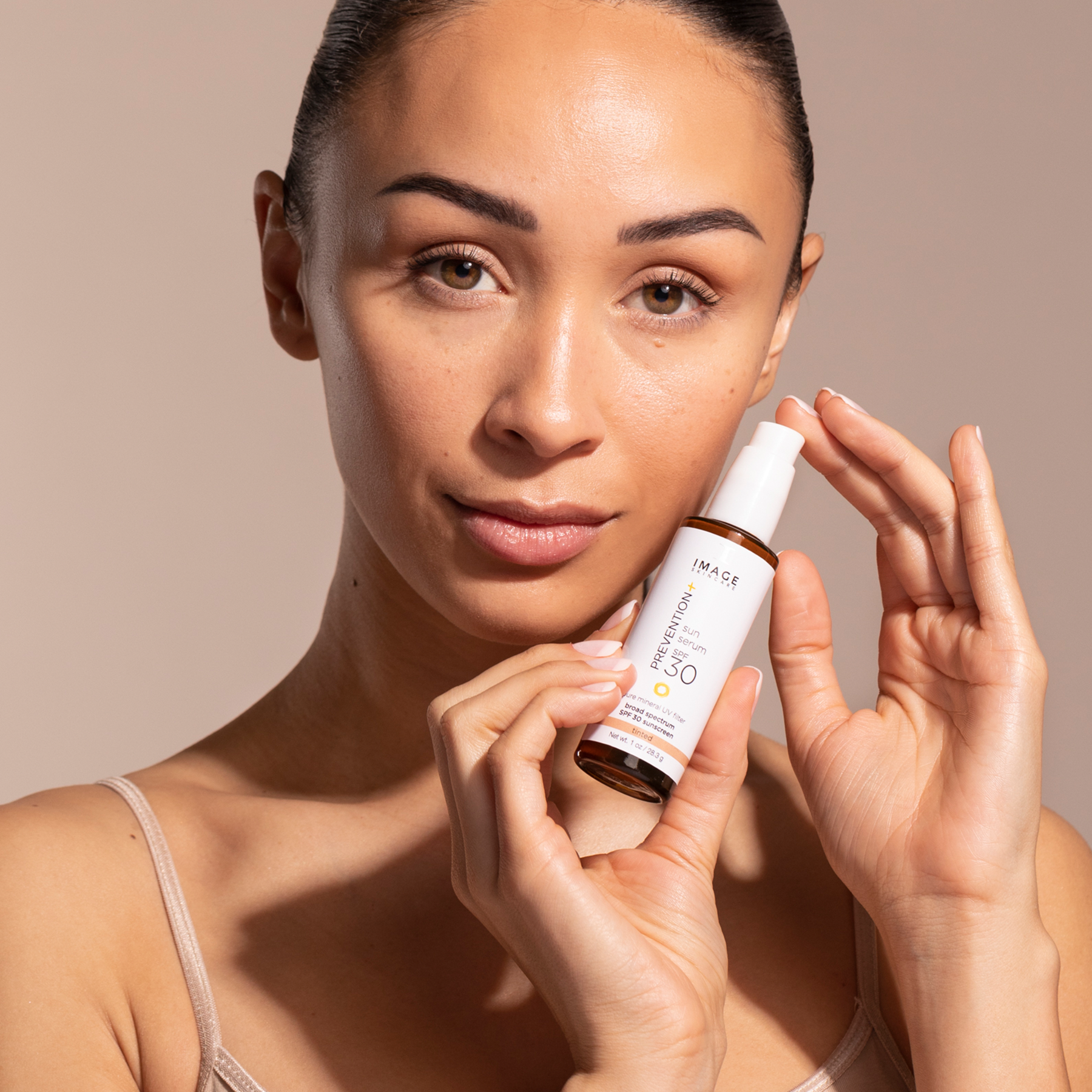 PREVENTION+ tinted sun serum SPF 30