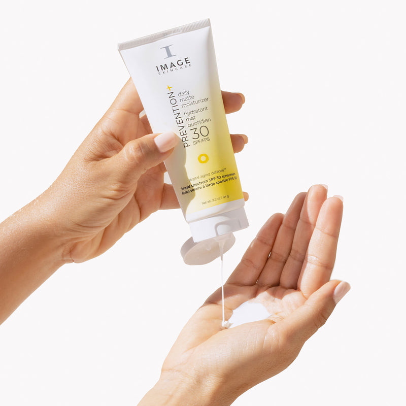  Putting Daily matte SPF moisturiser in the palm of right hand